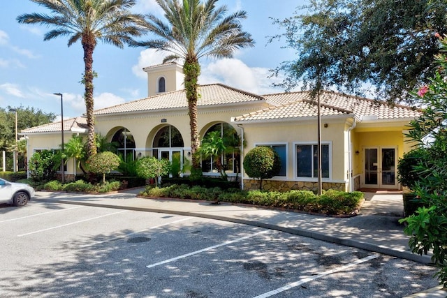 4951 Corsica Sq, Vero Beach, FL 32967 - view of building exterior with uncovered parking