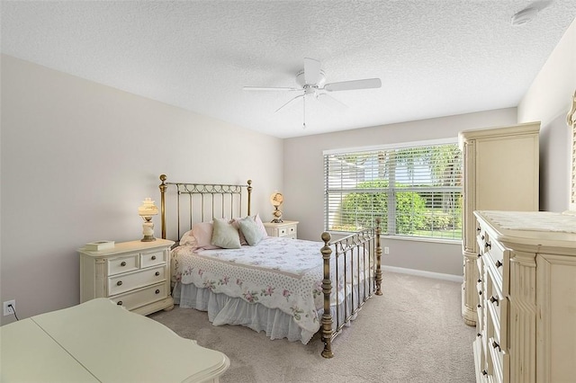 4951 Corsica Sq, Vero Beach, FL 32967 - bedroom featuring light carpet, ceiling fan, and a textured ceiling