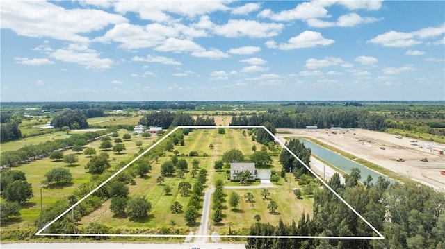 7387 61st St, Vero Beach, FL 32967 - drone / aerial view featuring a rural view and a water view