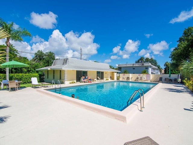 view of pool with a patio area