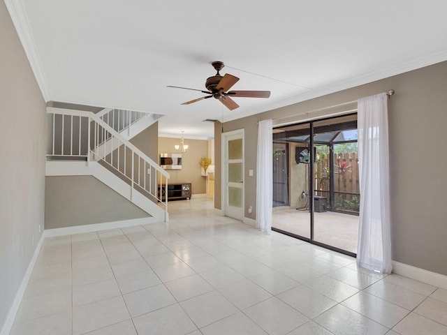 empty room featuring crown molding, ceiling fan with notable chandelier, and light tile patterned flooring