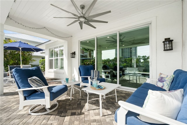 sunroom / solarium with ceiling fan