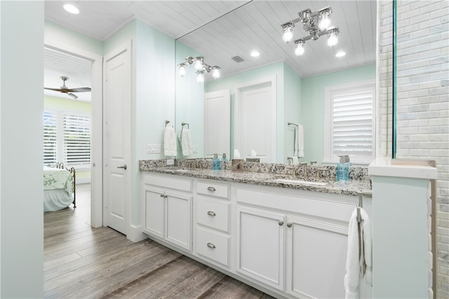 bathroom with wooden ceiling, a wealth of natural light, vanity, and hardwood / wood-style flooring