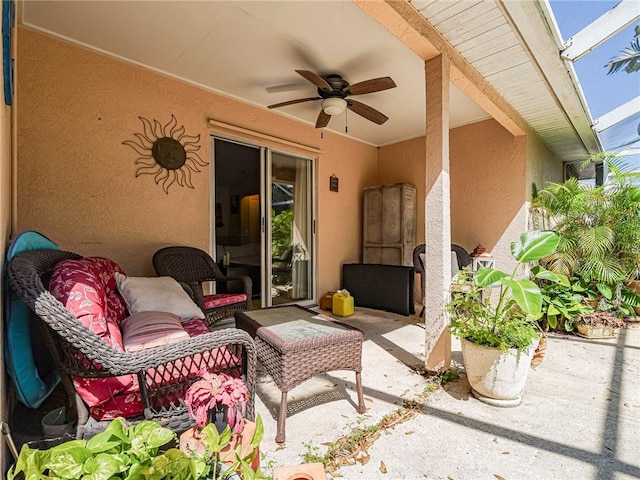 view of patio featuring ceiling fan