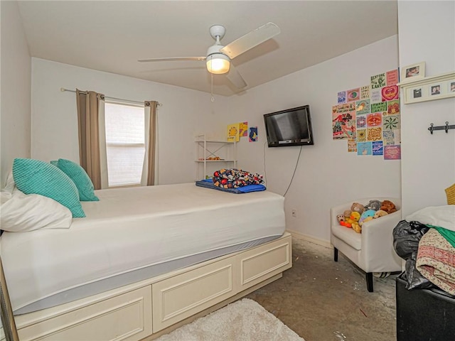 bedroom with a ceiling fan and concrete floors