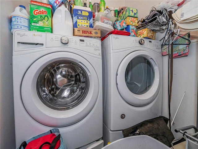 laundry area with washer and dryer and laundry area