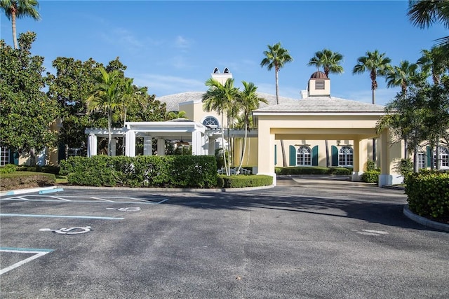 1510 Oak Harbor Blvd Unit 202, Vero Beach, FL 32967 - view of building exterior featuring uncovered parking