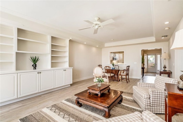 1510 Oak Harbor Blvd Unit 202, Vero Beach, FL 32967 - living area with light wood-style flooring, a tray ceiling, a ceiling fan, and recessed lighting