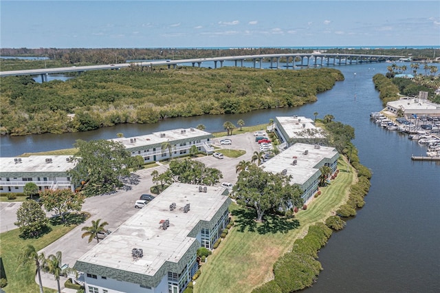 birds eye view of property featuring a water view