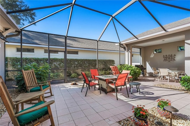 view of patio with a lanai