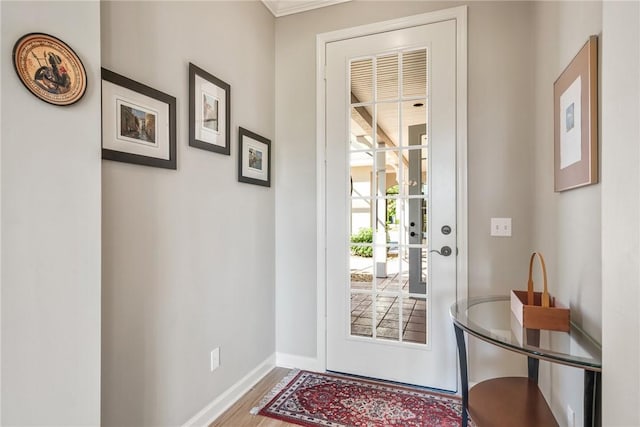 doorway with wood-type flooring