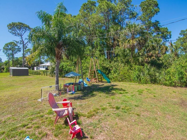view of yard with a playground
