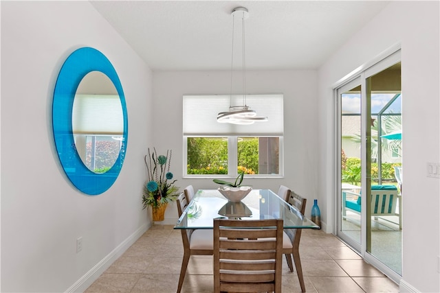 dining space with light tile patterned flooring