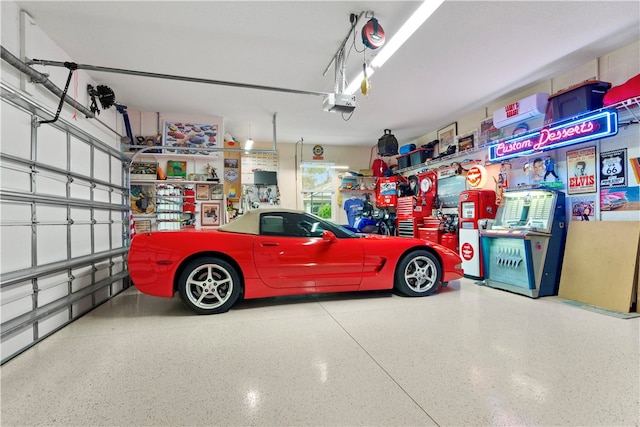 garage featuring a garage door opener