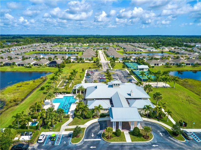 drone / aerial view with a water view