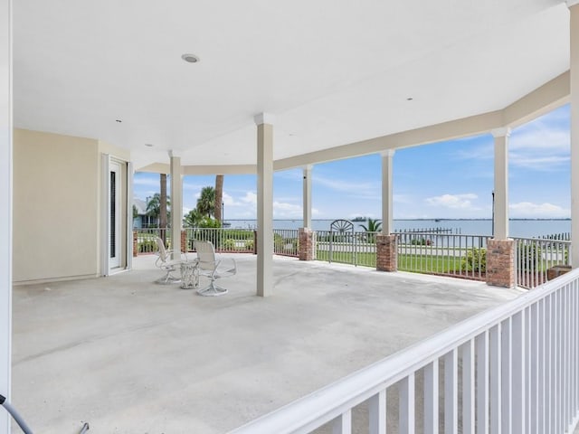 view of patio / terrace with a water view