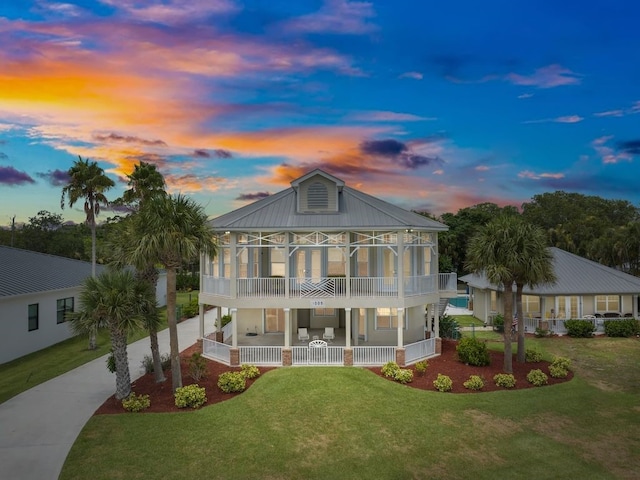 view of front of home with a lawn