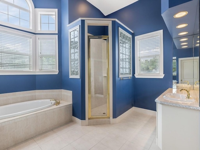 bathroom featuring vanity, tile patterned floors, and independent shower and bath