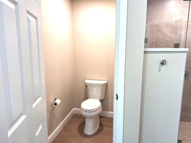 1590 Polynesian Ln, Sebastian, FL 32958 - bathroom with toilet and wood finished floors