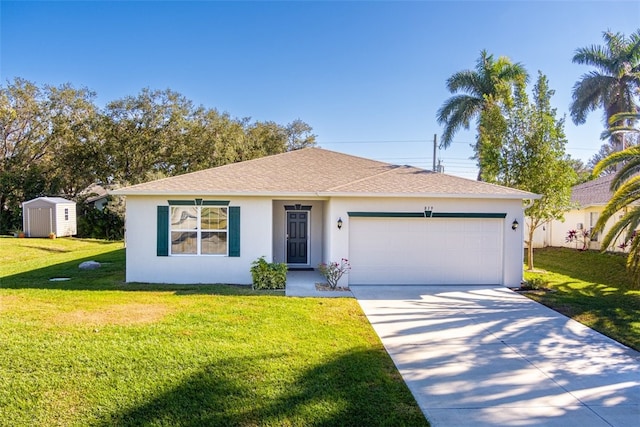 ranch-style home with a shed, a front lawn, and a garage