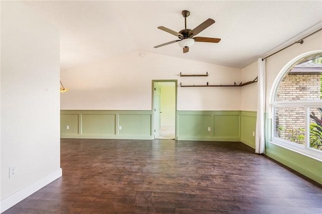 1030 47th Ave SW, Vero Beach, FL 32968 - unfurnished room with ceiling fan, a decorative wall, lofted ceiling, a wainscoted wall, and wood finished floors
