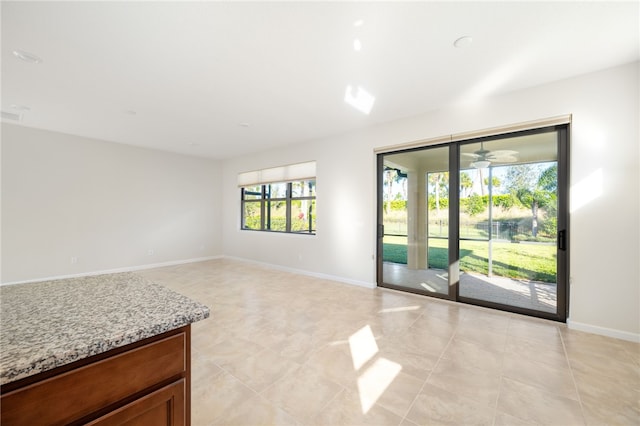 empty room featuring baseboards