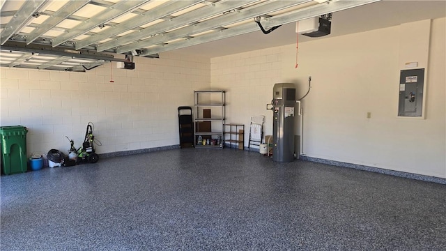 garage with hybrid water heater, a garage door opener, and electric panel