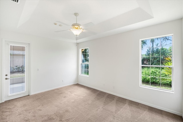 carpeted empty room with ceiling fan