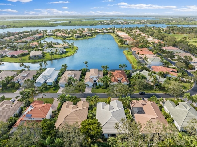 drone / aerial view with a water view