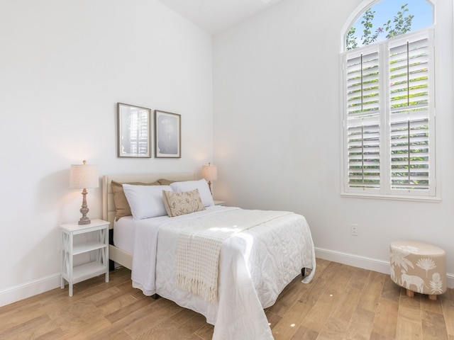 bedroom featuring light wood-type flooring