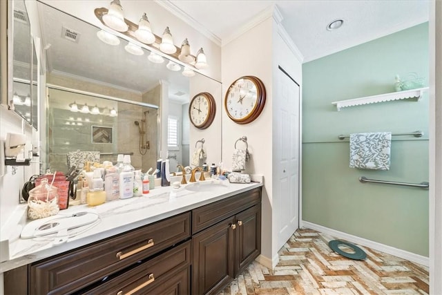 bathroom with visible vents, a stall shower, crown molding, baseboards, and vanity