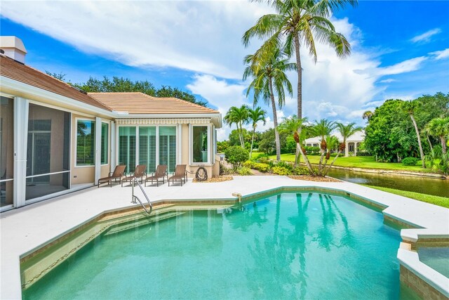 view of swimming pool featuring a patio area