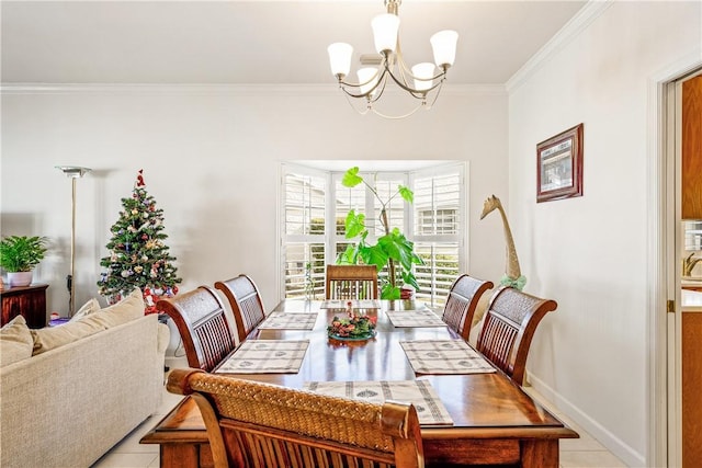 tiled dining space featuring a notable chandelier and crown molding