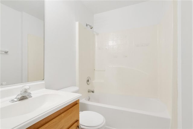 full bathroom with vanity, shower / bathing tub combination, and toilet