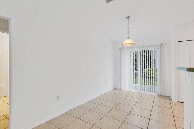 bathroom with walk in shower, tile patterned floors, toilet, and vanity