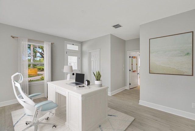 office space featuring light hardwood / wood-style floors