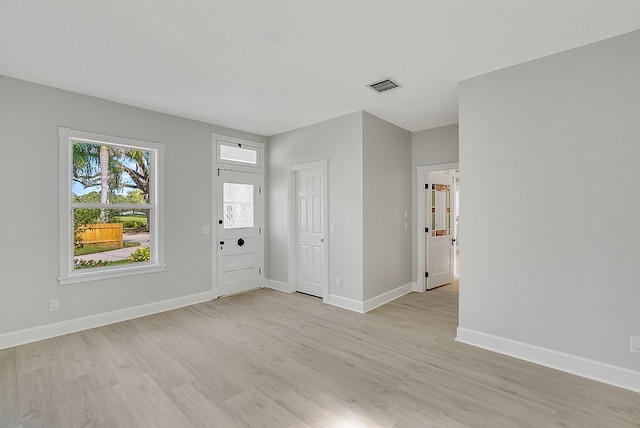 entryway with light hardwood / wood-style flooring