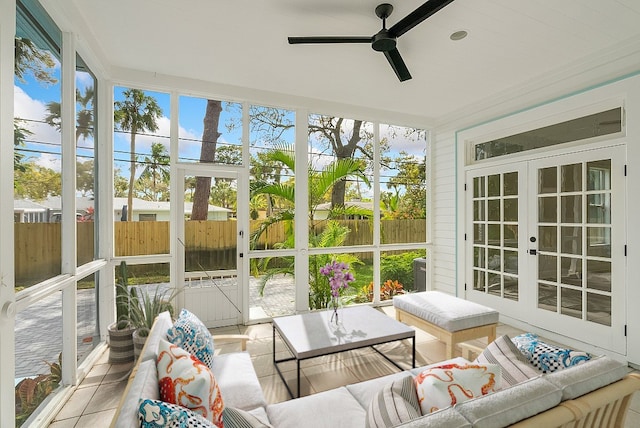 sunroom featuring ceiling fan