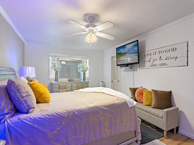 bedroom with wood-type flooring, ceiling fan, and crown molding