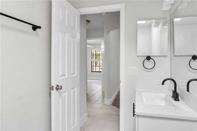 bathroom with vanity and tile patterned floors