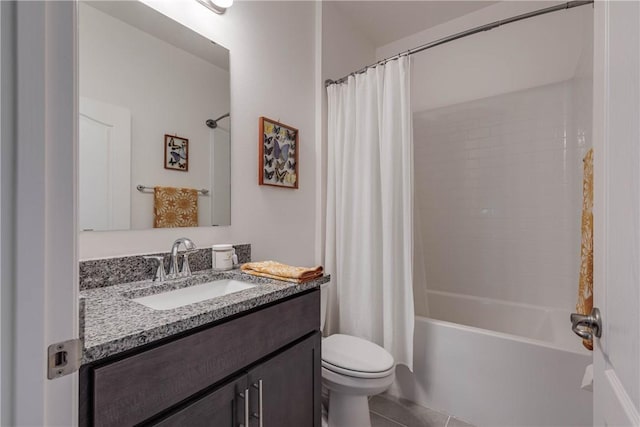 full bath with toilet, tile patterned floors, shower / bath combo with shower curtain, and vanity