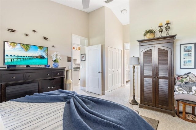 bedroom featuring ceiling fan, a closet, and french doors