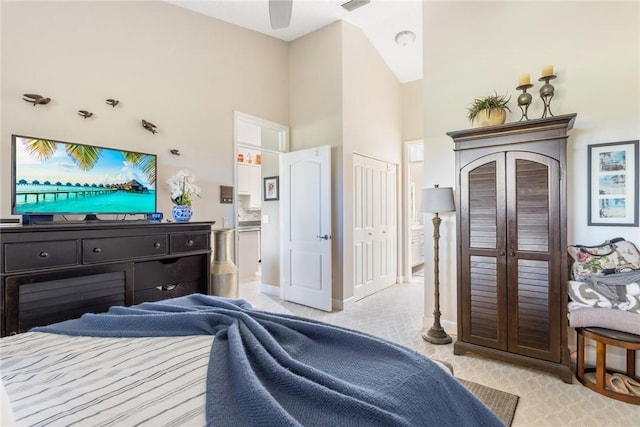 4877 N Newport Island Dr Unit 14D, Vero Beach, FL 32967 - bedroom featuring high vaulted ceiling and baseboards