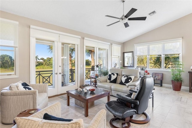4877 N Newport Island Dr Unit 14D, Vero Beach, FL 32967 - living area featuring french doors, vaulted ceiling, plenty of natural light, and a ceiling fan