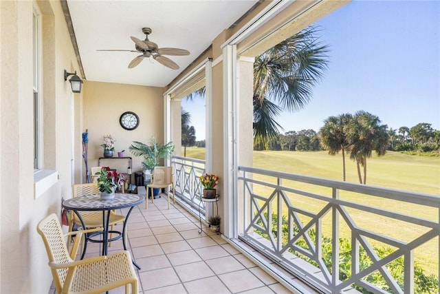 balcony featuring ceiling fan