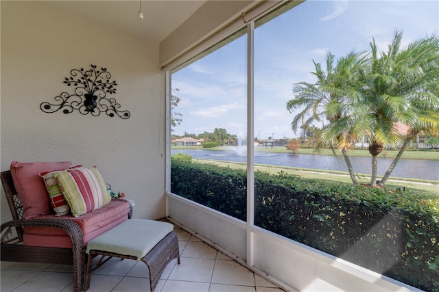 sunroom with a water view