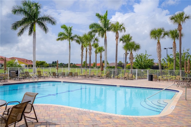 view of pool featuring a patio