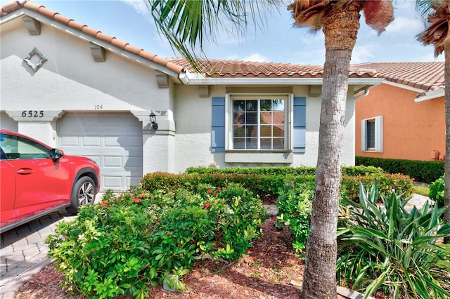 view of front of property featuring a garage