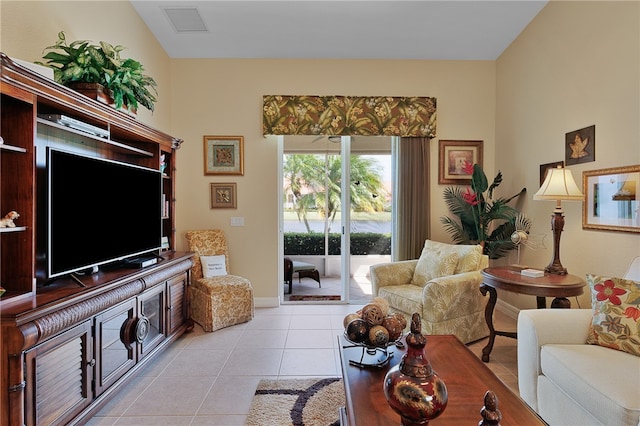 tiled living room with lofted ceiling