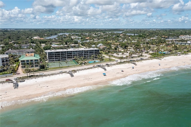 aerial view featuring a water view and a beach view